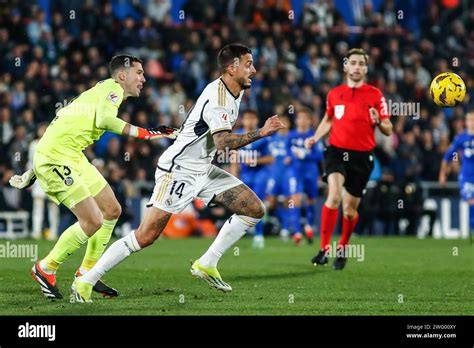 David Soria Of Getafe And Joselu Mato Of Real Madrid During The Spanish