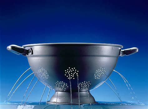 Colander Water Stock Photos, Pictures & Royalty-Free Images - iStock