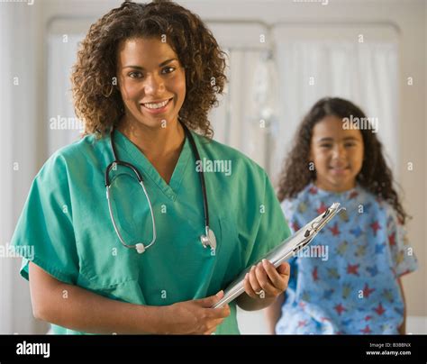 African Female Doctor Holding Chart Stock Photo Alamy