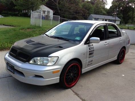 Mitsubishi Lancer Oz Rally Cars