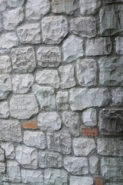 Stone veneer wall Stock Photo by ©oppdowngalon 73524663