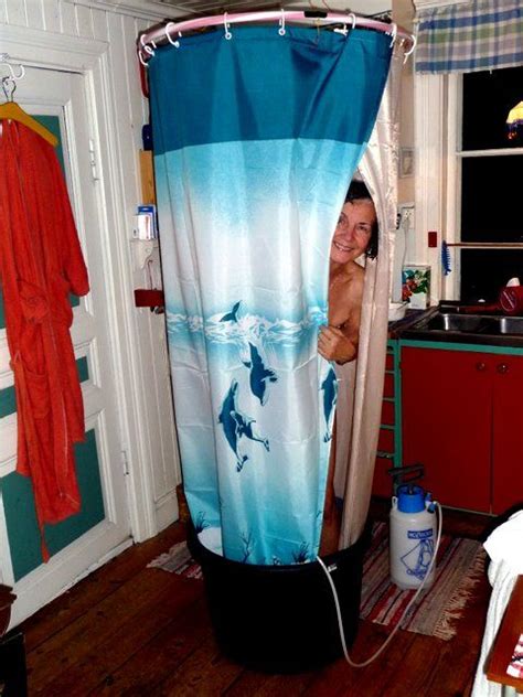 Shower Curtain On A Hula Hoop Hanging From A Hook In The Ceiling On The Floor A Wide Barrel