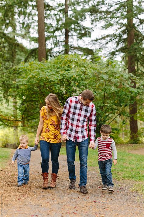 "Happy Family Walking In Park During The Fall" by Stocksy Contributor ...