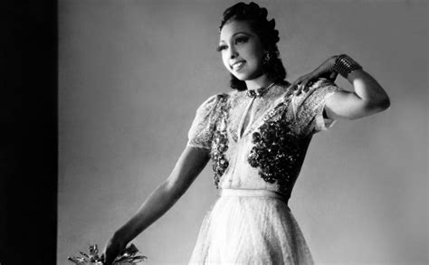 Great Outfits In Fashion History Josephine Baker In A Glam Dress With A Bunch Of Cookies