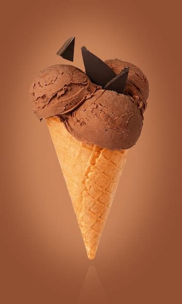 Premium Photo | Chocolate ice cream in a waffle cone