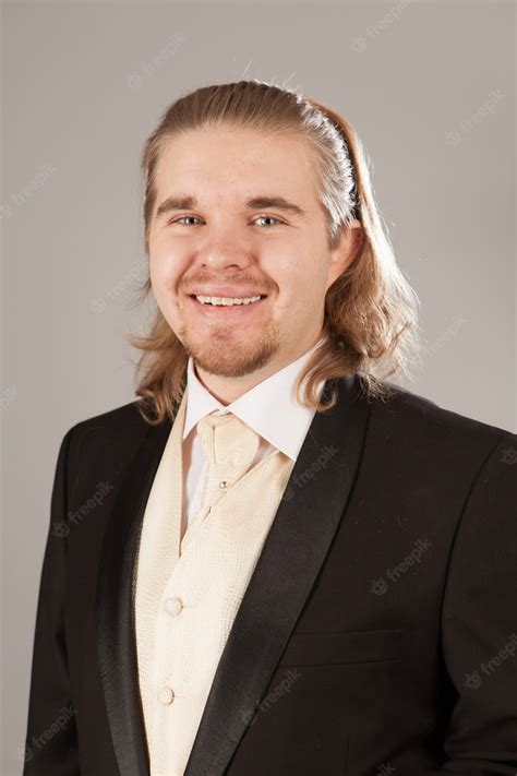 Premium Photo Portrait Of Handsome Young Man In A Tuxedo
