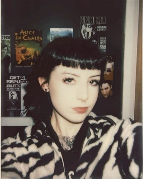 A black hair with bangs look reveals hidden features 39