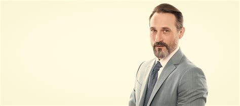 Premium Photo Mature Boss With Grizzled Hair In Suit Isolated On