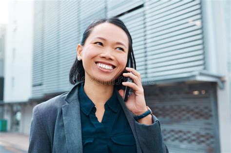 Asian Woman Phone Call And Talking To Business Contact In With A Smile