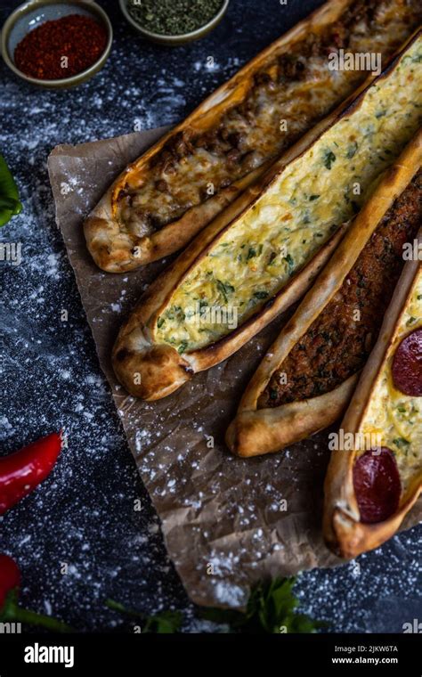 A top view of the Turkish flatbread pizza with meat, pepperoni and ...