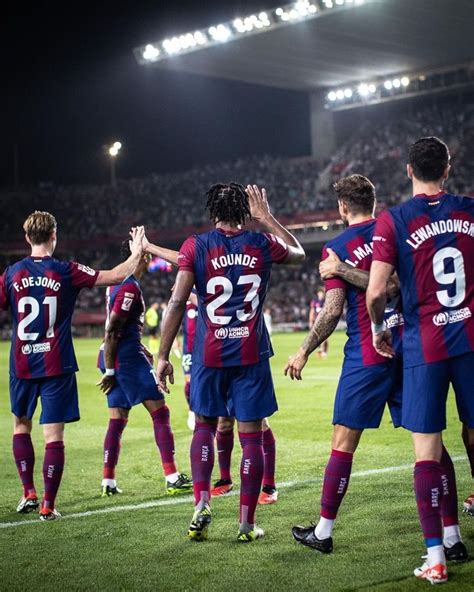 The Soccer Players Are Congratulating Each Other After Their Team S Win