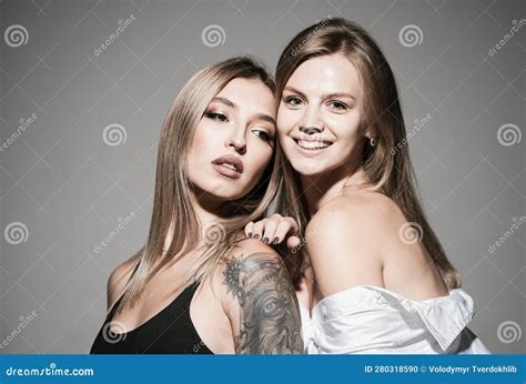 Portrait Of Beautiful Lesbian Couple Hugging Romantic Girl Friend