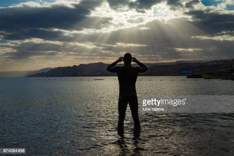 Man Diving Silhouette Photos And Premium High Res Pictures Getty Images