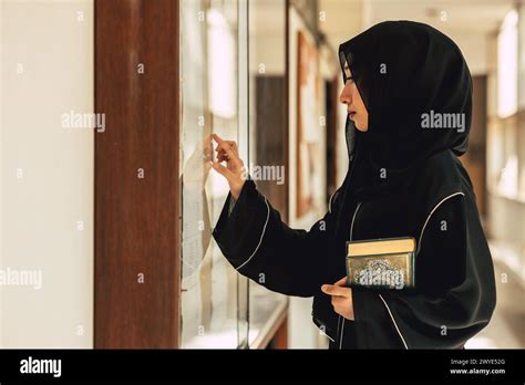 Muslim Niqab Woman Read And Learning The Quran And Faith The Holy Al