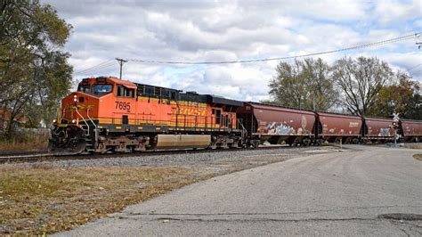 Bnsf 7695 Golden Swoosh Leads A Grain Train Solo Colona Il Youtube