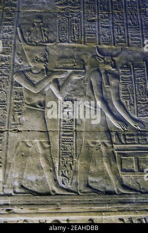 An Ancient Egyptian Hieroglyphic Carving Showing The Goddess Isis