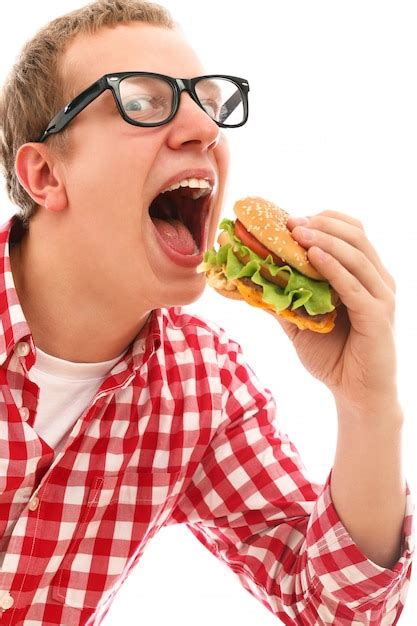 Free Photo Funny Man In Glasses Eating Hamburger Isolated On A White