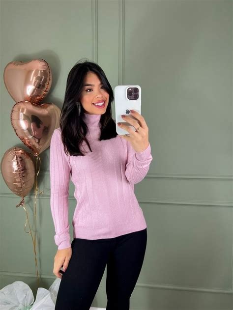 A Woman Taking A Selfie In Front Of Balloons