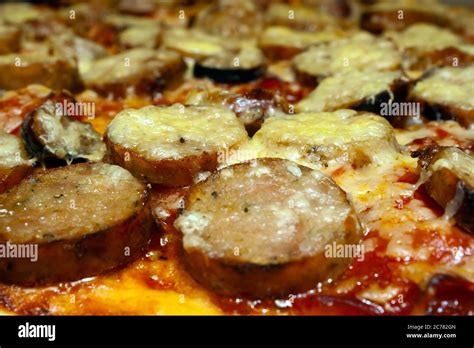 Pizza Toppings Of Pepperoni And Sausage Close Up With A Shallow Depth