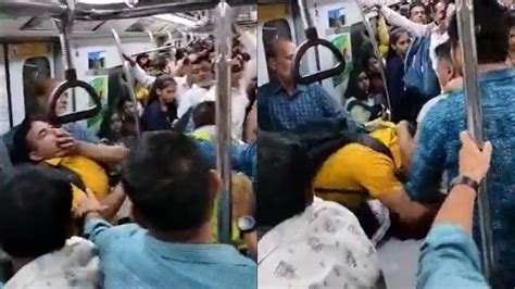 Delhi Metro Fight Video दिल्ली मेट्रो के नाम फिर जुड़ा एक कांड अब चले लात घूंसे वायरल हुआ