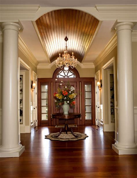 Stained Arched Ceiling Enhances Foyer And Relates To Front Door Traditional Entry