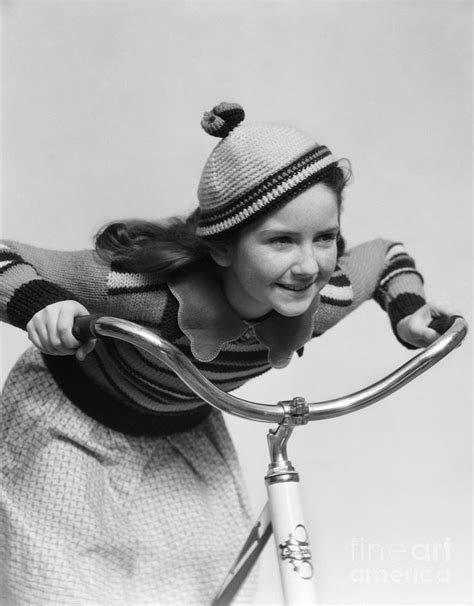 Girl Riding A Bike C 1930s Photograph By H Armstrong Roberts Classicstock Fine Art America