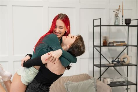 Portrait Of Two Tenderly Hugging Women Lesbian Intimacy Stock Photo