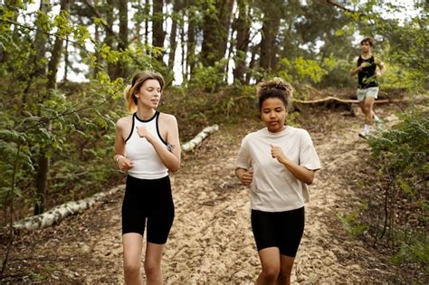 Free Photo Front View Women Running Together