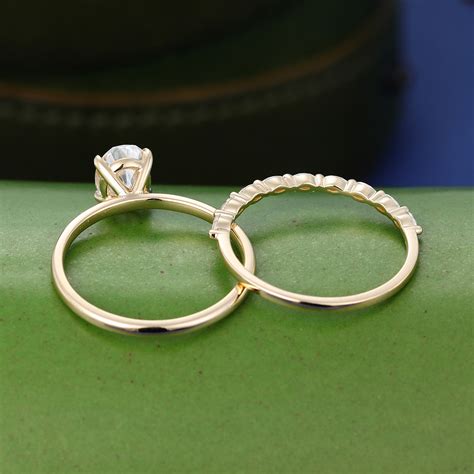 Yellow Gold Oval Cut Moissanite Moissanite Bridal Ring Set Gardensring