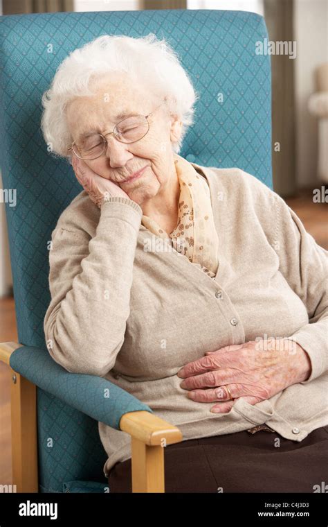 Old Woman Asleep In Chair Hi Res Stock Photography And Images Alamy