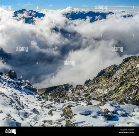 Tatra Mountains above clouds - panorama Stock Photo - Alamy