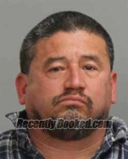 Recent Booking Mugshot For Juan Gil Contreras In Brazos County Texas