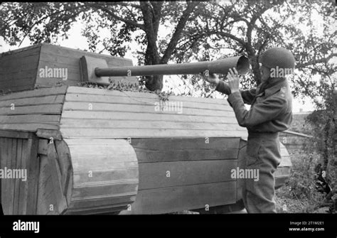 The British Army In Normandy 1944 An Officer Inspects A German Dummy Tank Made Of Wood 31 July