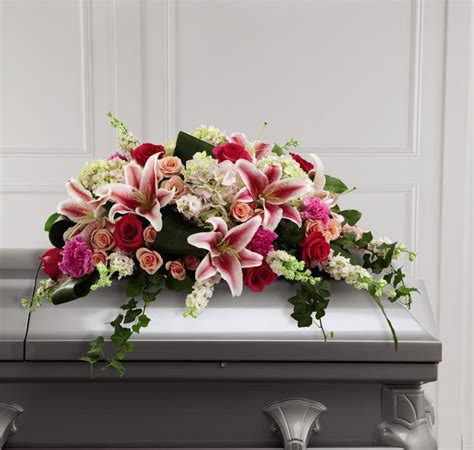 Stargazer Lily Casket Spray Funeralflowers