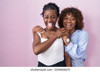 Two African Women Standing Over Pink Stock Photo 2194433675 Shutterstock