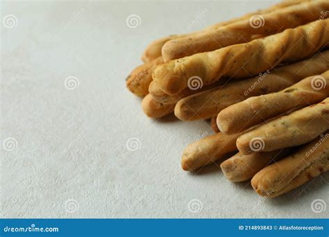 Sabrosas Palitos De Pan Grissini Sobre Fondo Blanco Texturizado Imagen