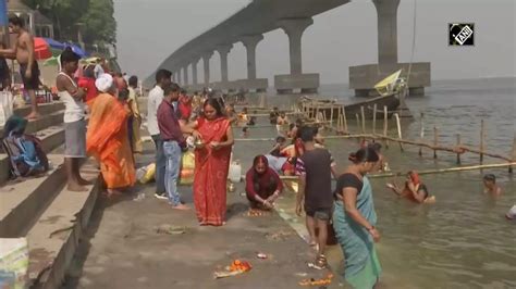 Four Day Long Chaiti Chhath Puja Begins Devotees Take Holy Dip In Ganga