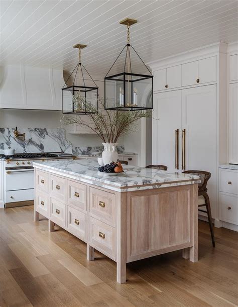 Beige Wooden Center Island With Brass Cup Pulls Transitional Kitchen