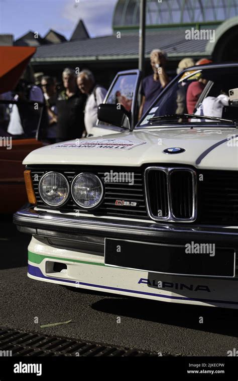 A Vertical View Of A BMW 3 Series Car During The Rallye Des Princesses