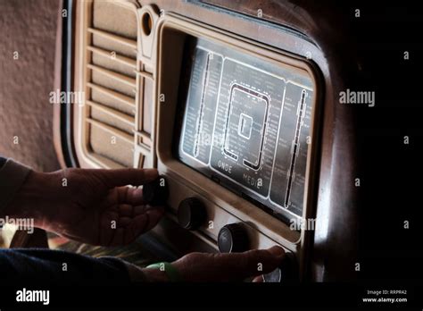 hands using vintage old radio Stock Photo - Alamy