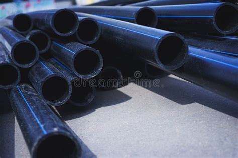 Stack of Black Plastic Pipes for Water Supply or Sewerage Prepared for ...