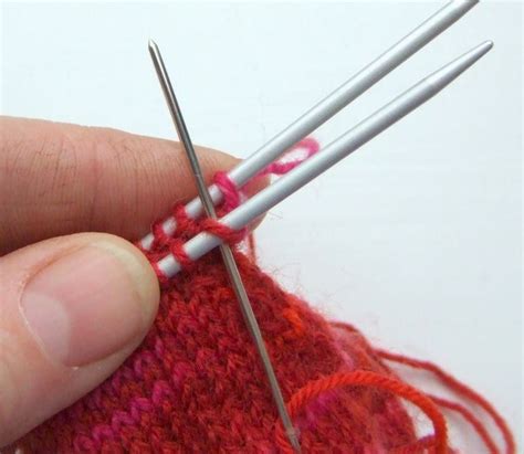 Someone Is Knitting Something With Two Needles