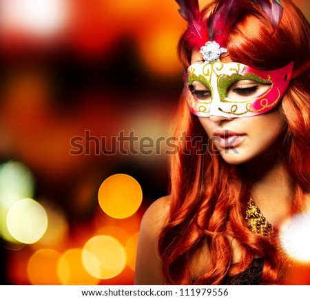 Masquerade Beautiful Girl In A Carnival Mask Over Holiday Blinking