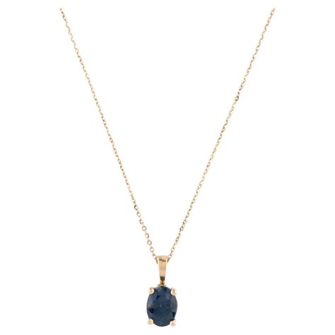 "Beneath the Waves Sapphire Ocean Pendant - A Symphony of Blue Elegance