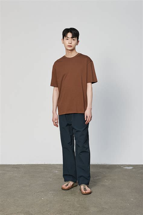 23ss 크리스피 이지 세미와이드 팬츠 [네이비] The Knit Company