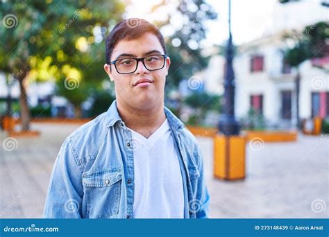 Down Syndrome Man Smiling Confident Standing At Park Stock Image