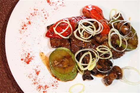 Fried Beef Liver with Mushrooms, Vegetables and Spices. Stock Photo - Image of dinner, black ...