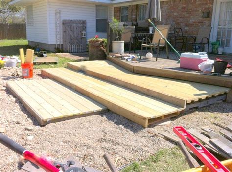 Remodelaholic Build A Wooden Pallet Deck For Under 300 Pallet