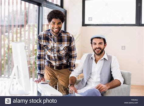 Happy Gay Couple Smiling At The Camera Stock Photo Alamy