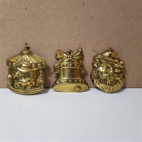 Three Brass Christmas Tree Ornaments Santa Carousel Bell Etsy